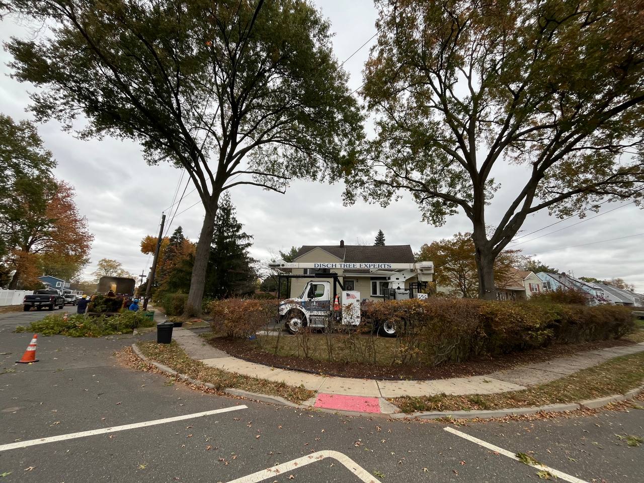 Disch truck on a residential corner — Central NJ neighborhood